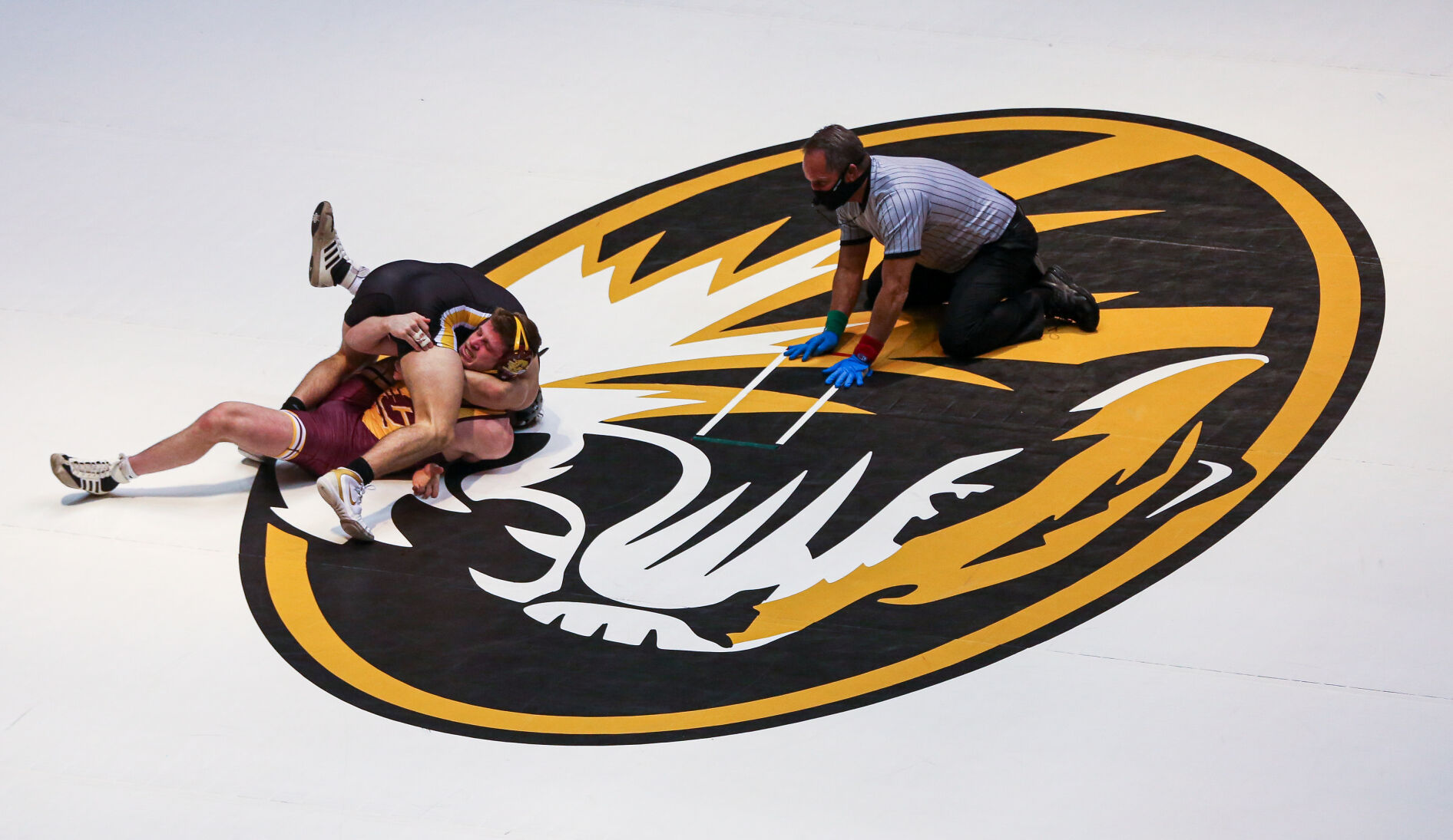 Missouri's Peyton Mocco wrap himself around Central Michigan's Jake Lowell (copy)
